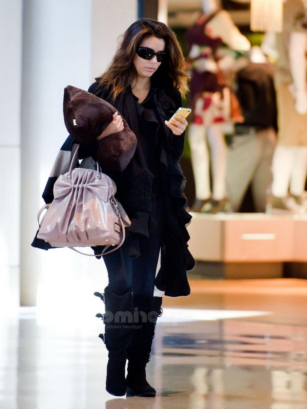 16P Eva Longoria showing off her ass in see through tights at LAX Airport