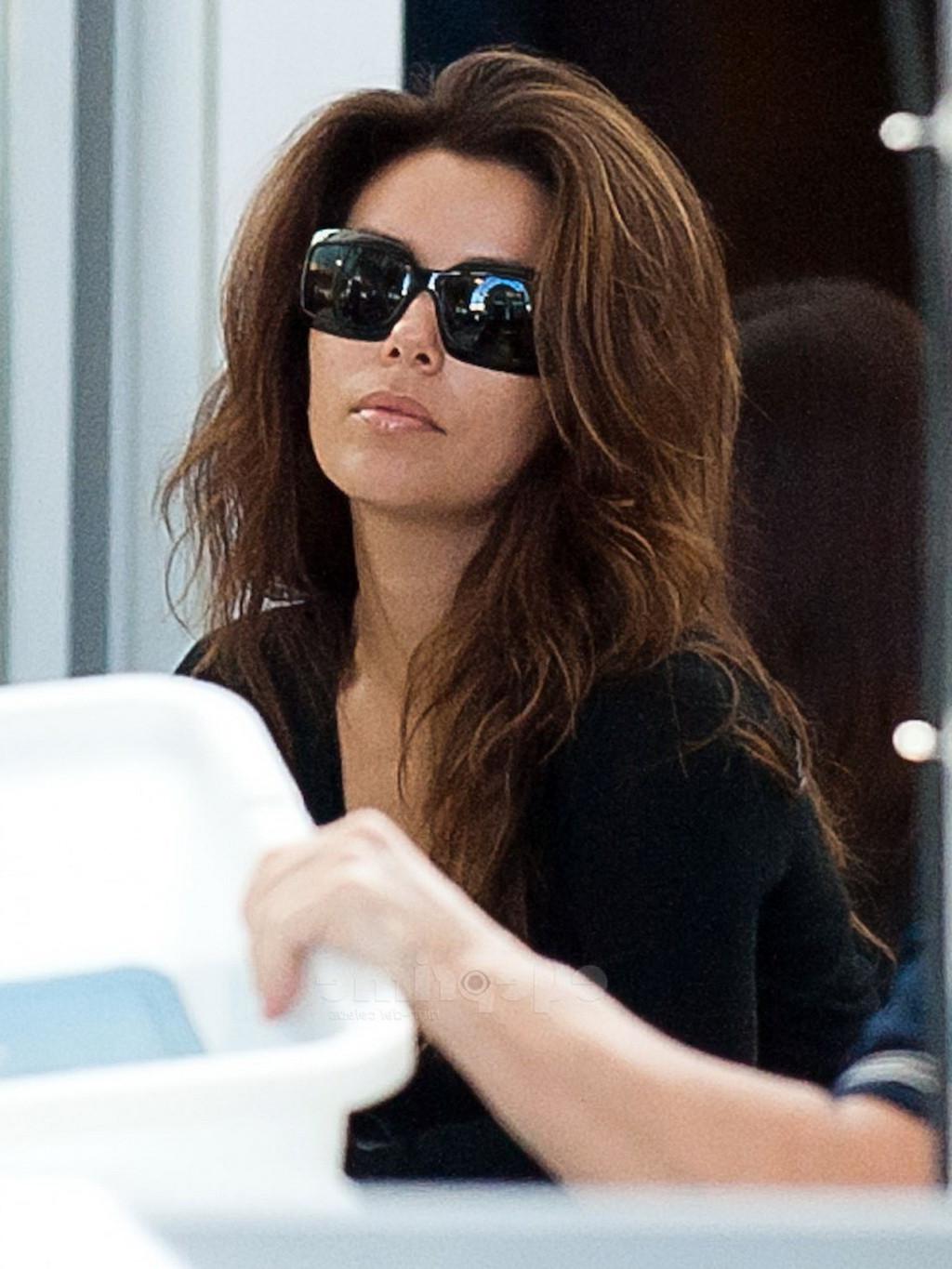 16P Eva Longoria showing off her ass in see through tights at LAX Airport