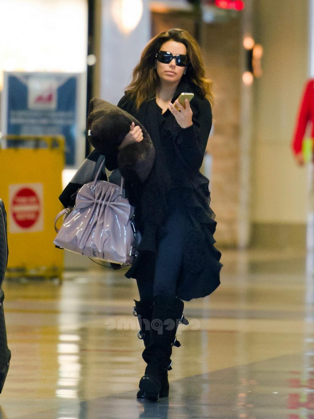 16P Eva Longoria showing off her ass in see through tights at LAX Airport
