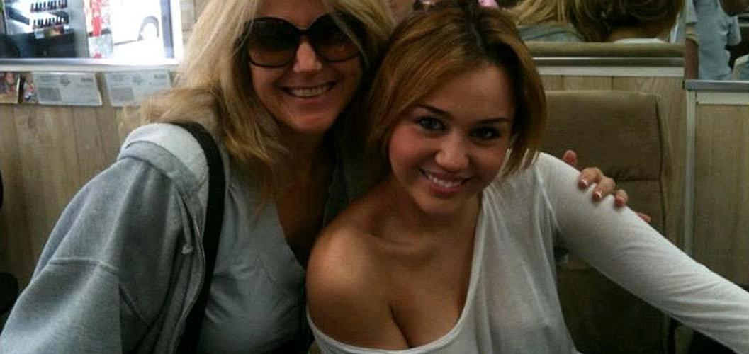 16P Miley Cyrus exposing sexy body and hard nipples in see thru blouse