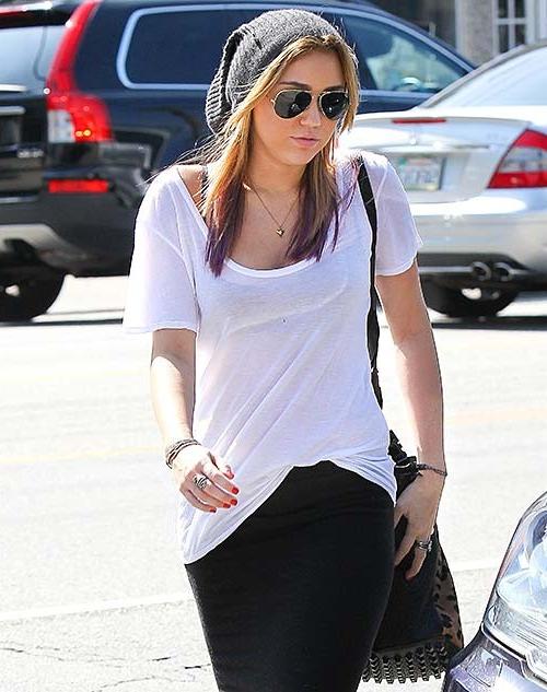 16P Miley Cyrus exposing sexy body and hard nipples in see thru blouse