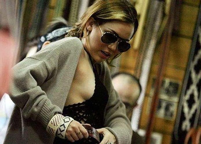 16P Miley Cyrus exposing sexy body and hard nipples in see thru blouse