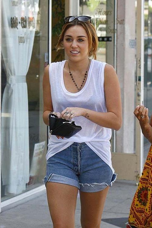 16P Miley Cyrus exposing sexy body and hard nipples in see thru blouse