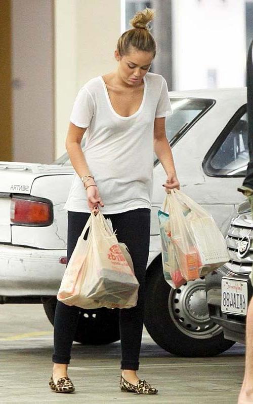 16P Miley Cyrus exposing sexy body and hard nipples in see thru blouse