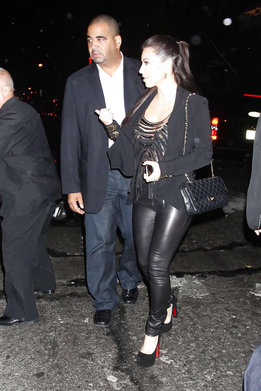16P Kim Kardashian show sexy body in bikini and see thru top