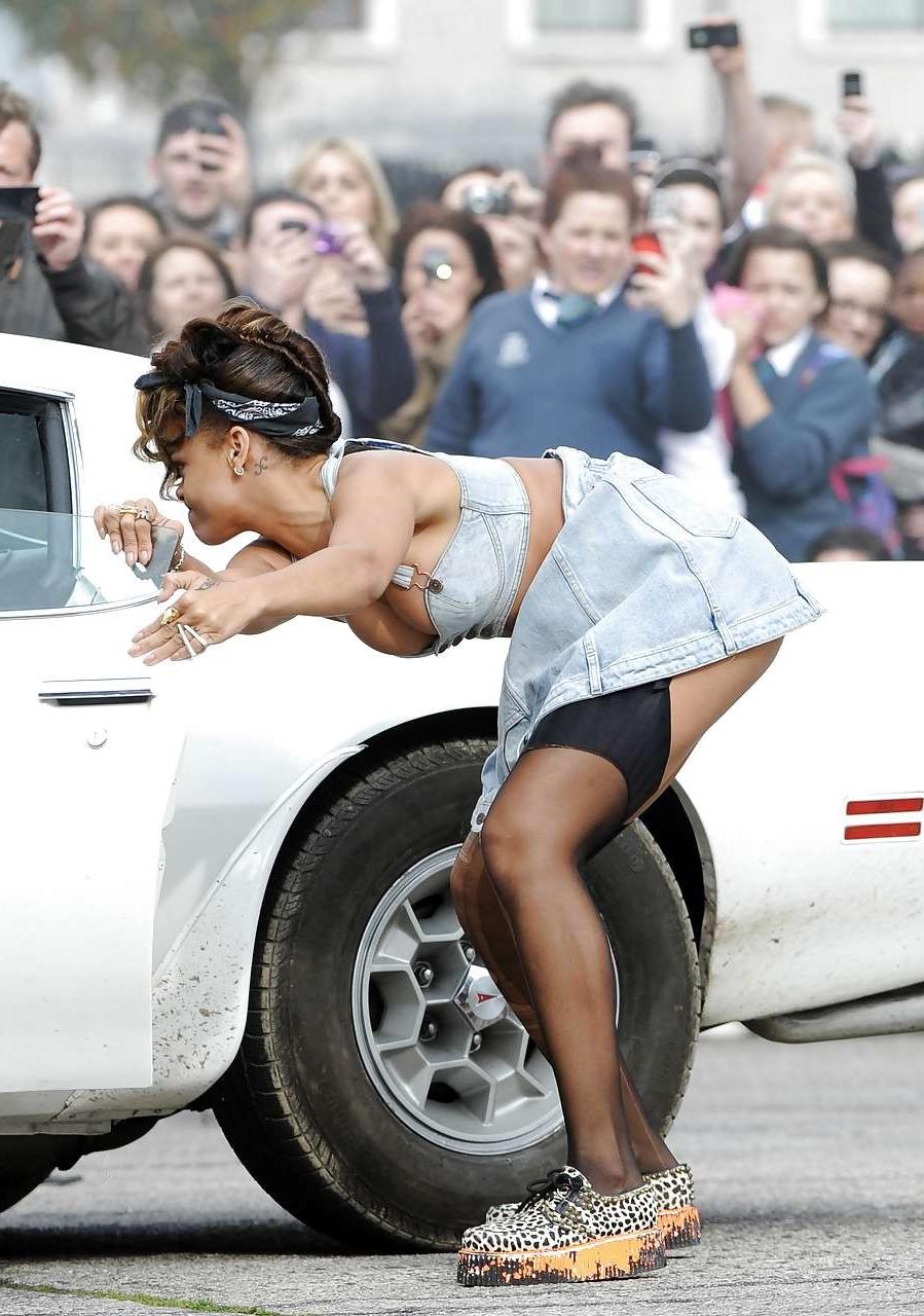 16P Rihanna in stockings and showing her tits in see thru top paparazzi pictures