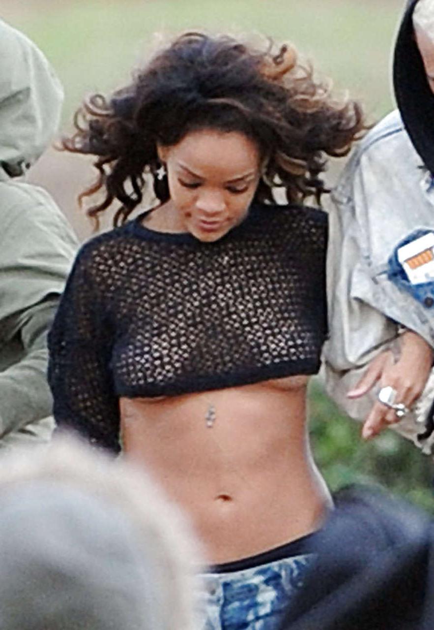 16P Rihanna in stockings and showing her tits in see thru top paparazzi pictures