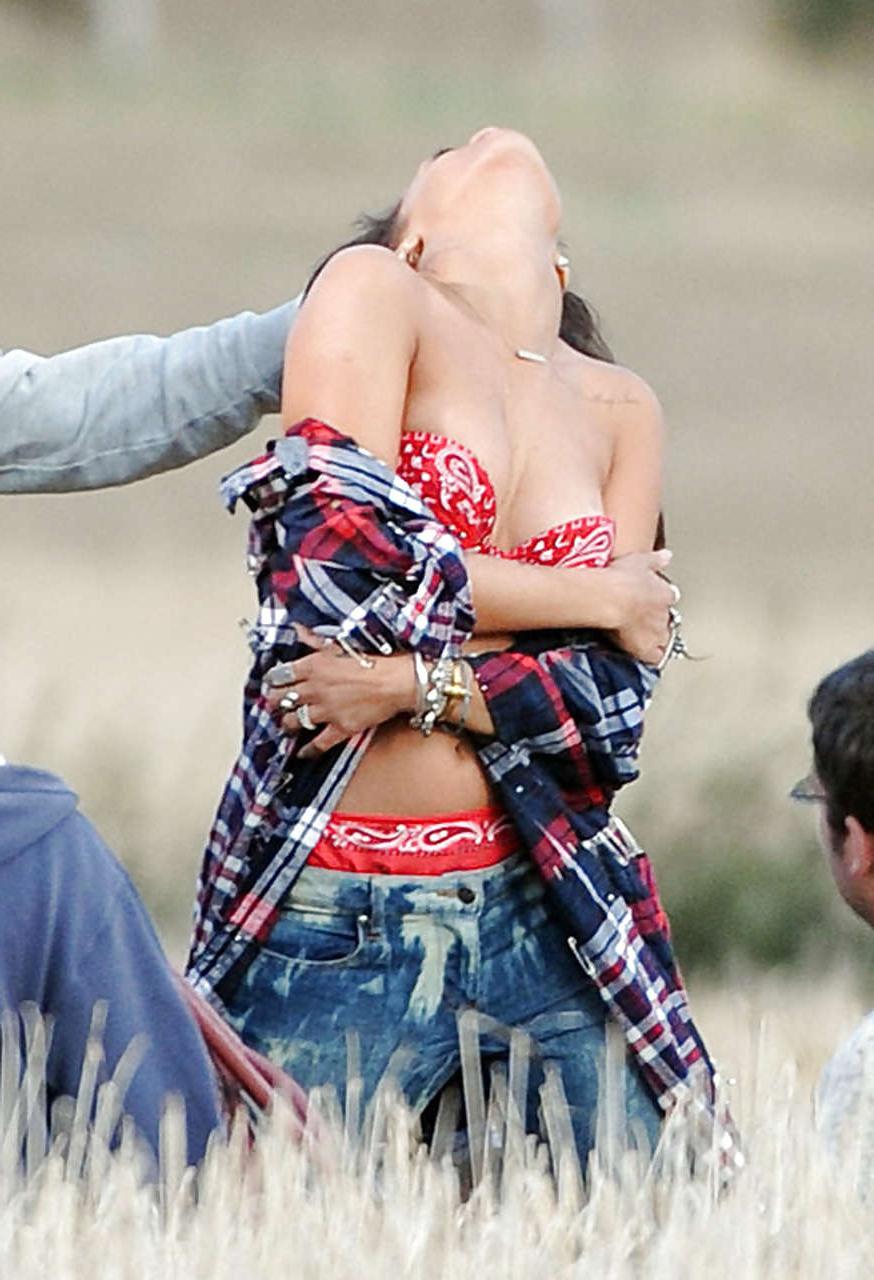 16P Rihanna in stockings and showing her tits in see thru top paparazzi pictures