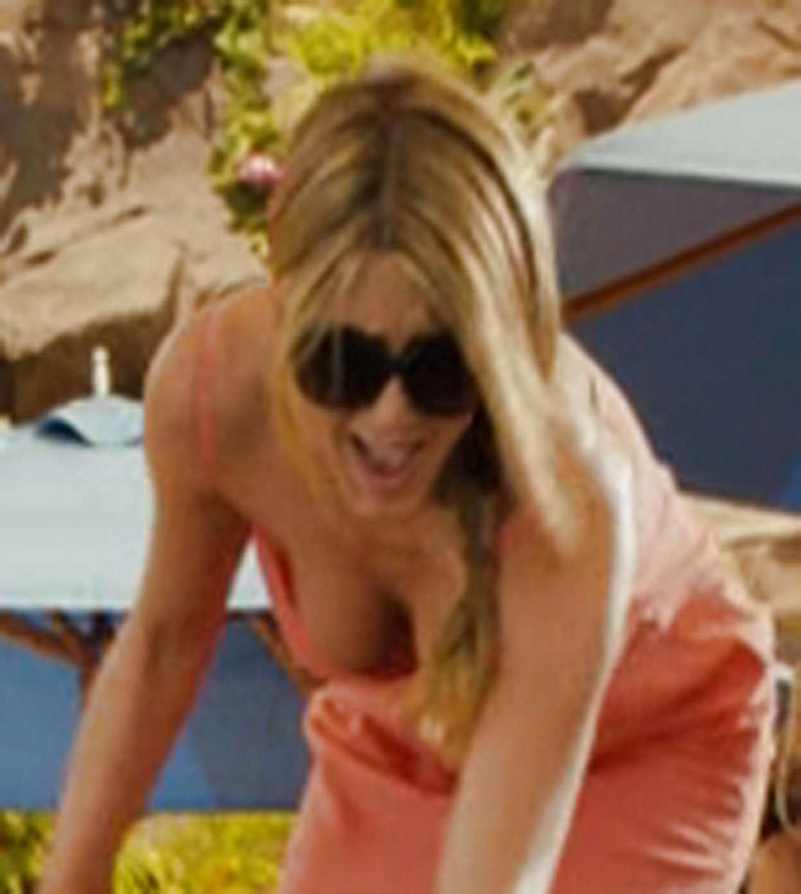 16P Jennifer Aniston in bikini and downblouse and show panties