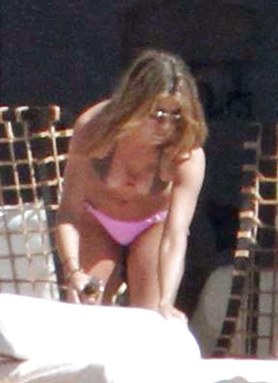 16P Jennifer Aniston in bikini and downblouse and show panties