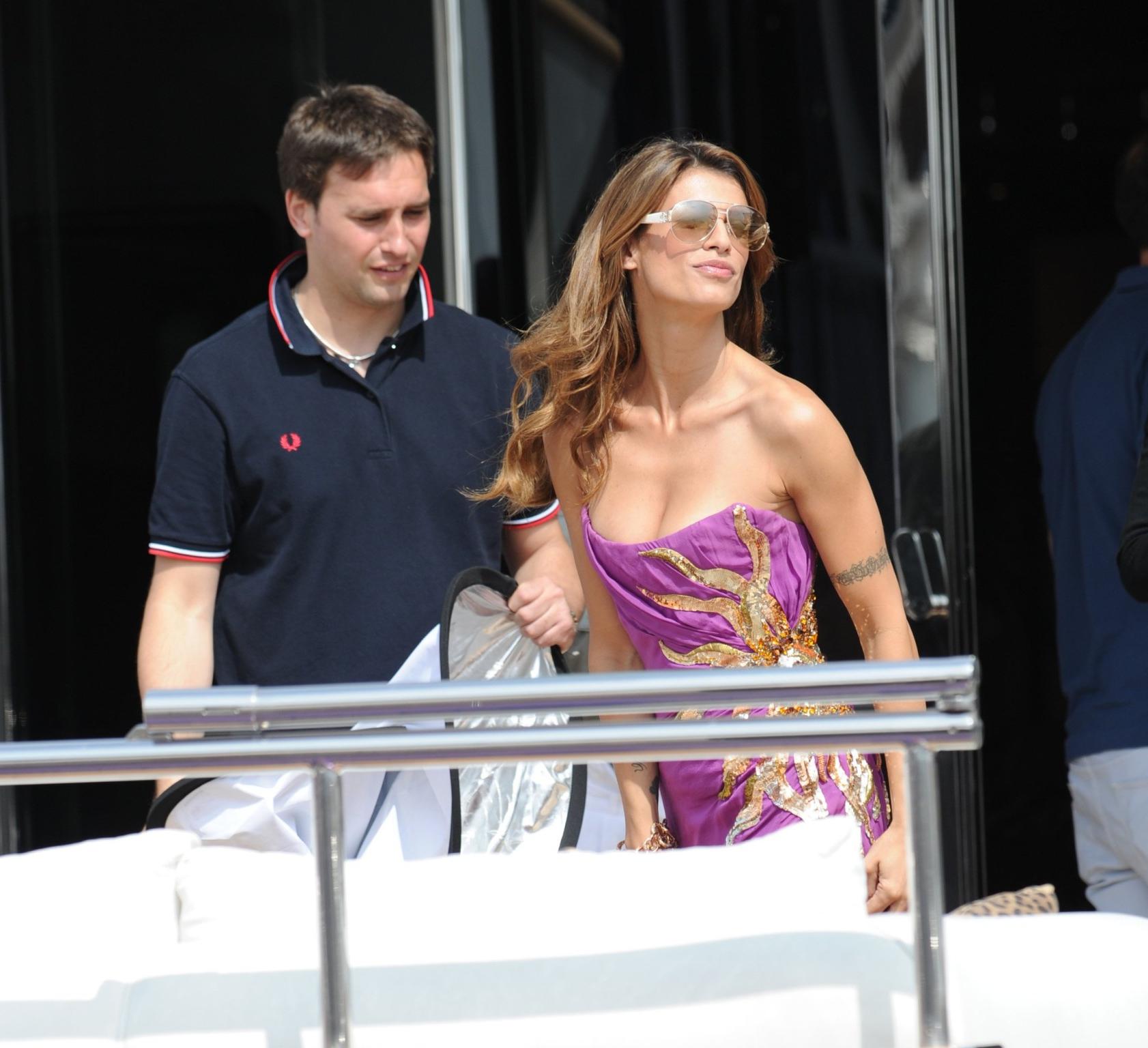 16P Elisabetta Canalis downblouse  upskirt during a photo session on Roberto Cavali'