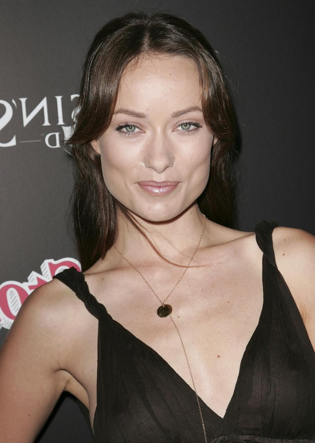 16P Olivia Wilde shows off her boobs wearing see-through dress at The Rolling Stone 