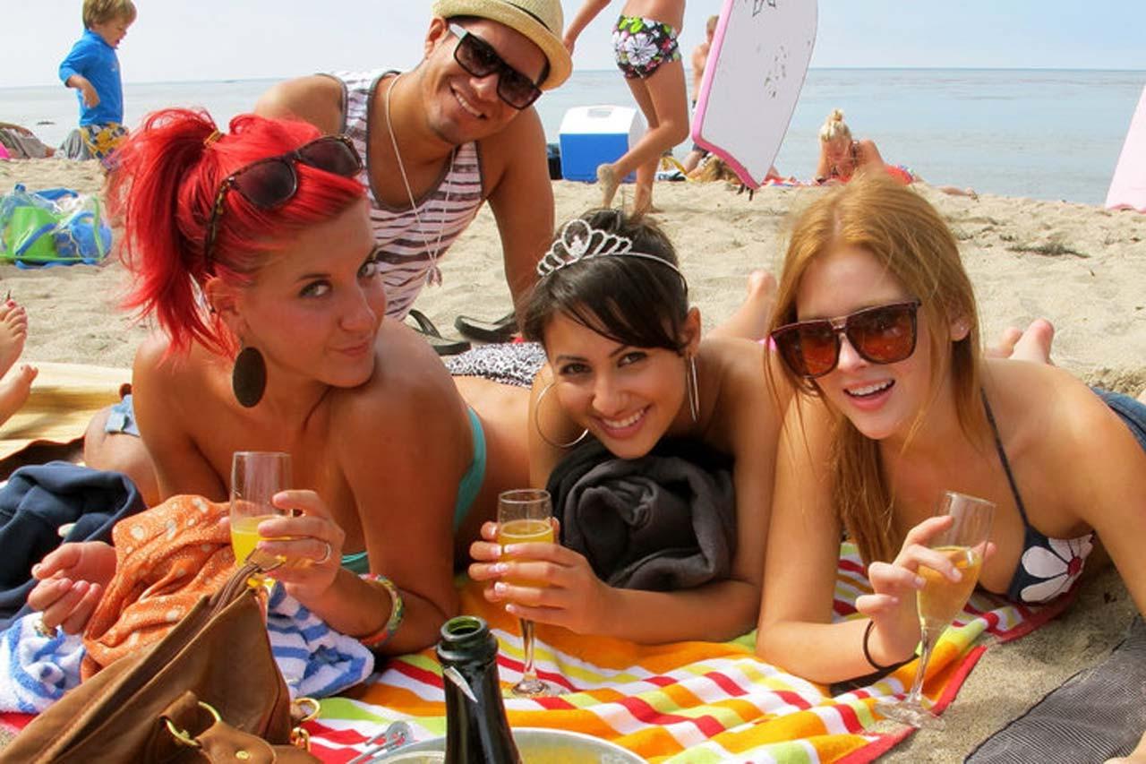 16P Renee Olstead showing her big boobs in see thru top and posing sexy with friends