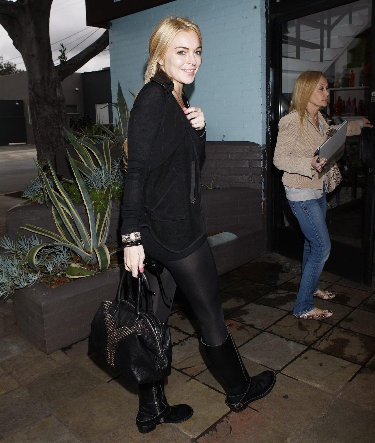 16P Lindsay Lohan showing off her big boobs wearing see-through top in LA