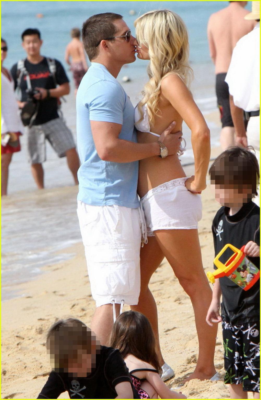 16P Paris Hilton wearing sexy white bikini  see-through shorts at the beach in Cabo 