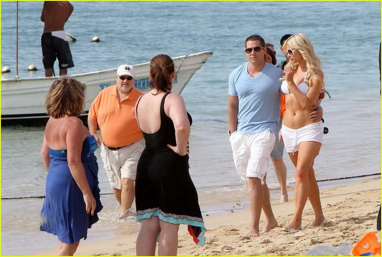 16P Paris Hilton wearing sexy white bikini  see-through shorts at the beach in Cabo 