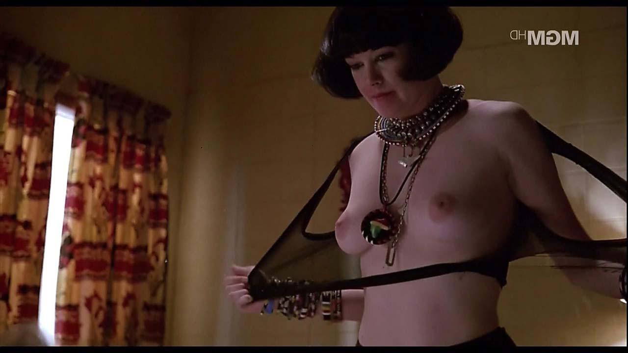 10P Melanie Griffith exposing her nice tits and fucking with some guy in movie