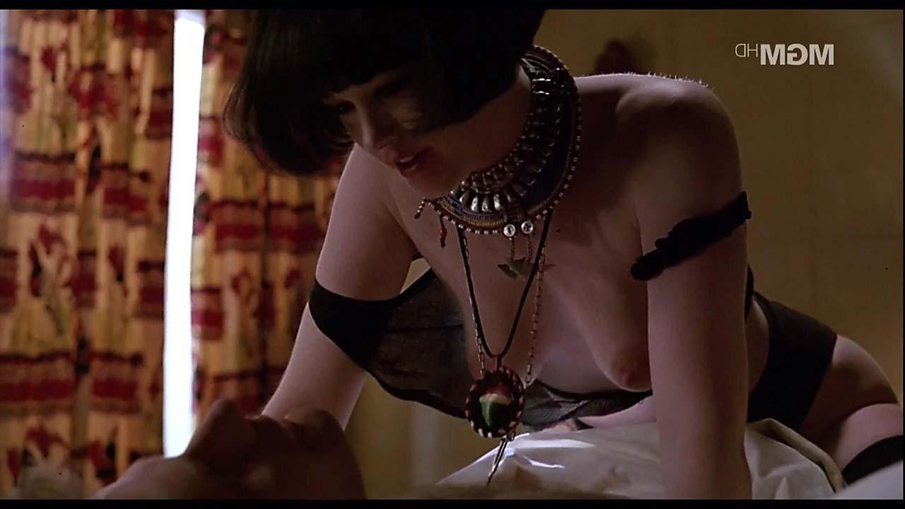 10P Melanie Griffith exposing her nice tits and fucking with some guy in movie