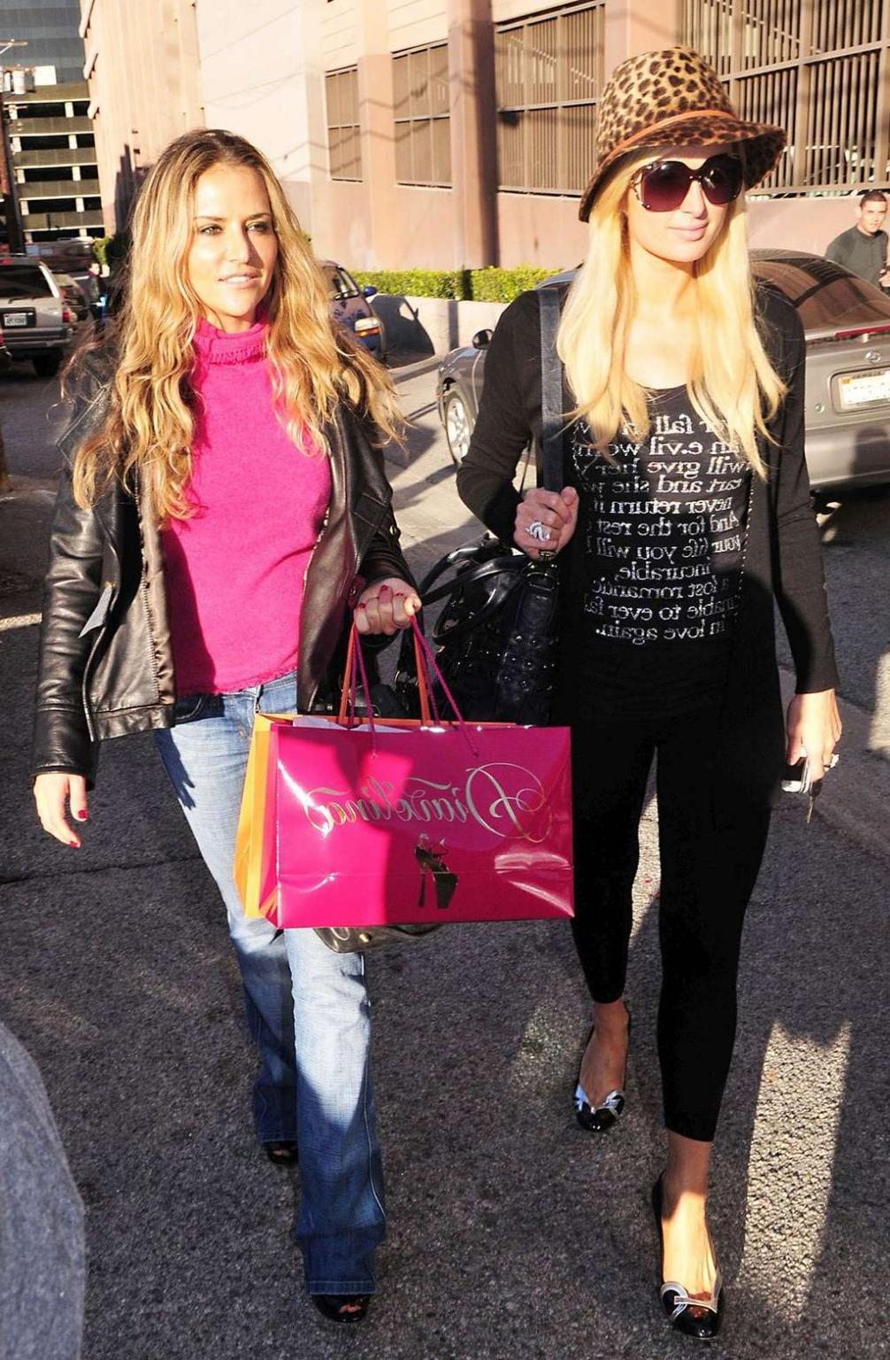 10P Paris Hilton in see thru leggings flashing her ass on street paparazzi pictures