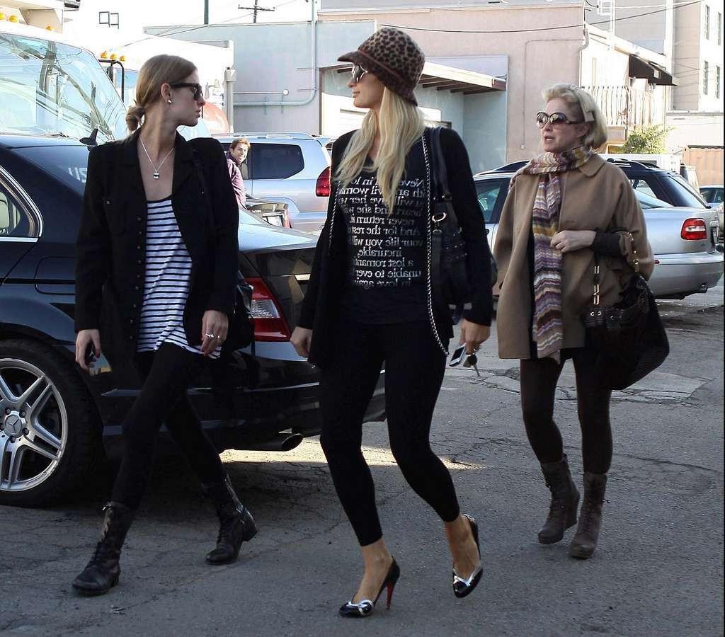 10P Paris Hilton in see thru leggings flashing her ass on street paparazzi pictures