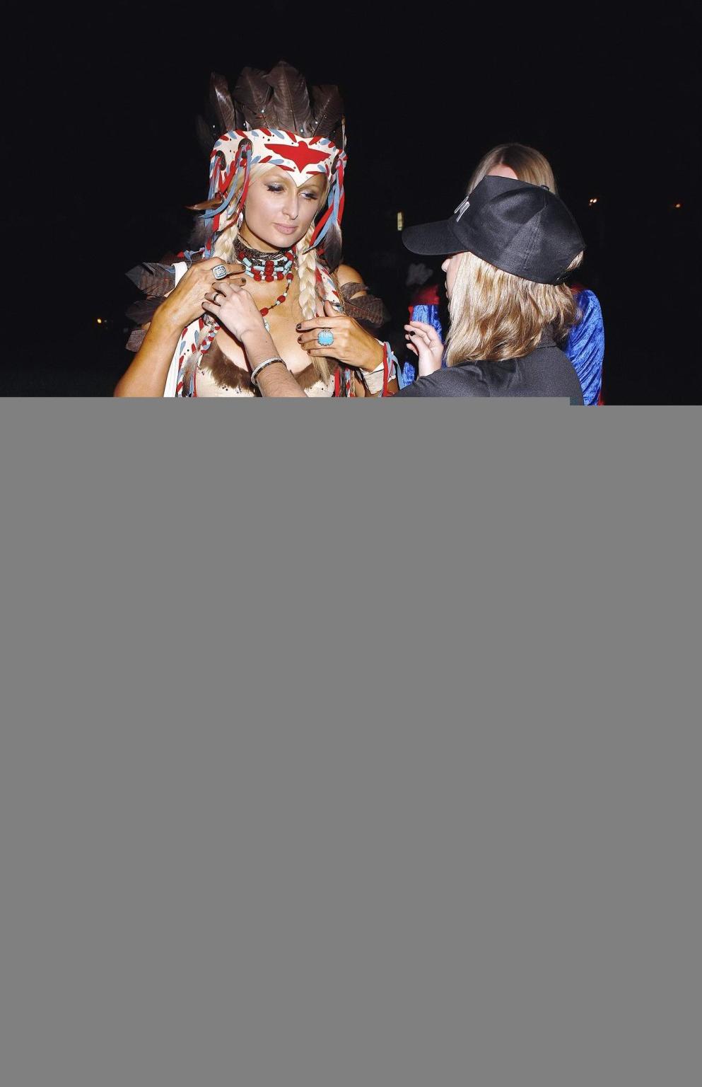 16P Paris Hilton nip slip at the PB Mansion Halloween Party