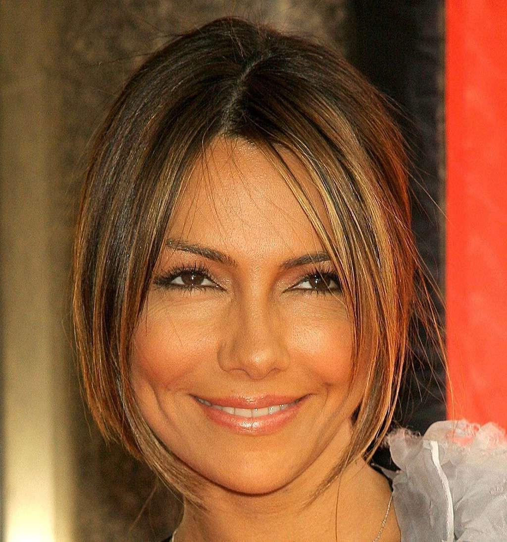 10P Vanessa Marcil looking very sexy and hot in see thru outfit and showing her tato
