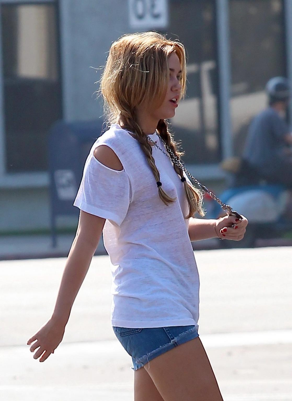 16P Miley Cyrus braless wearing see-through T-shirt in Toluca Lake