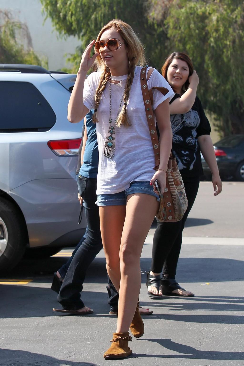 16P Miley Cyrus braless wearing see-through T-shirt in Toluca Lake