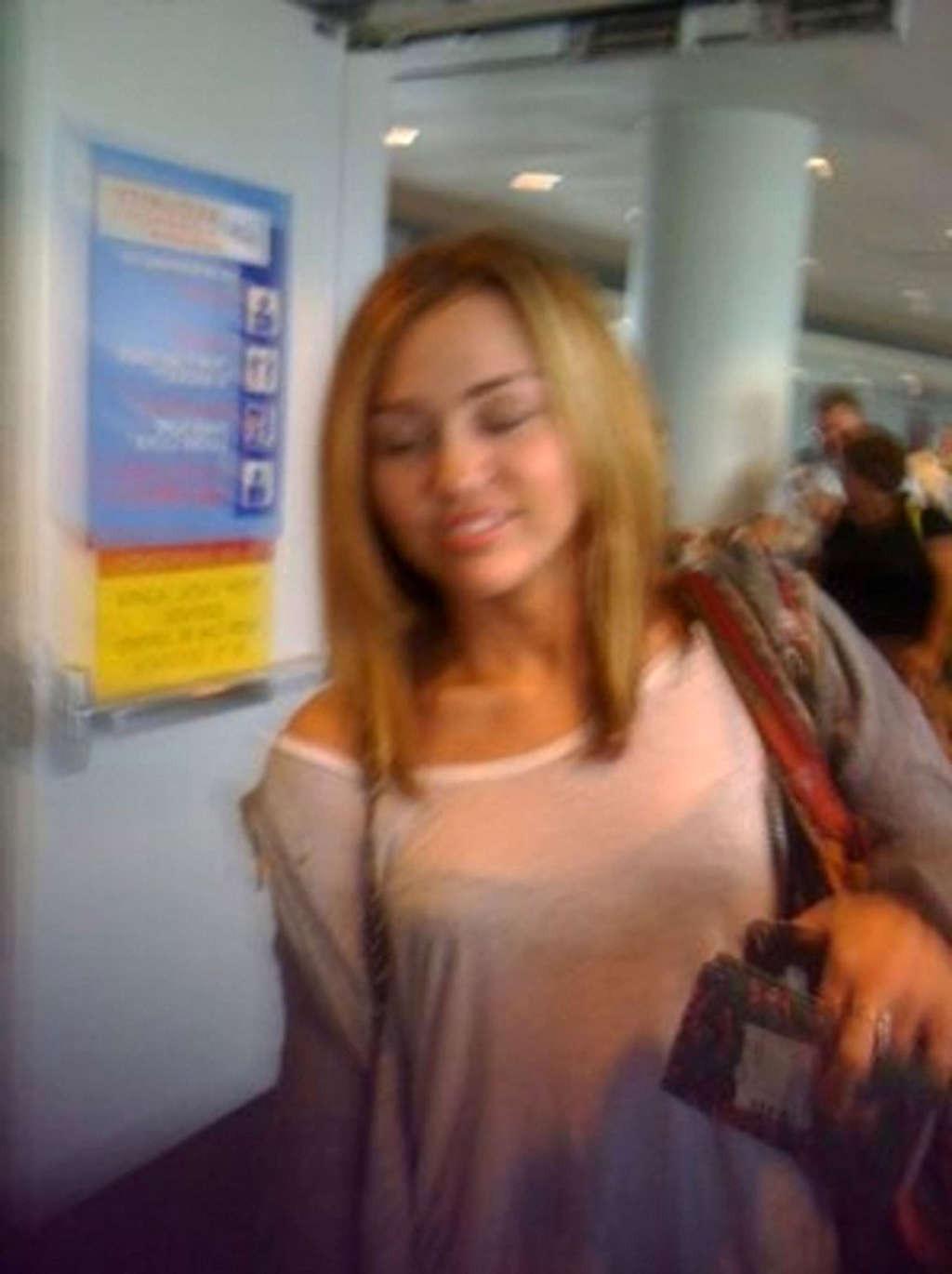 16P Miley Cyrus exposing fucking sexy body and nice tits in see thru shirt