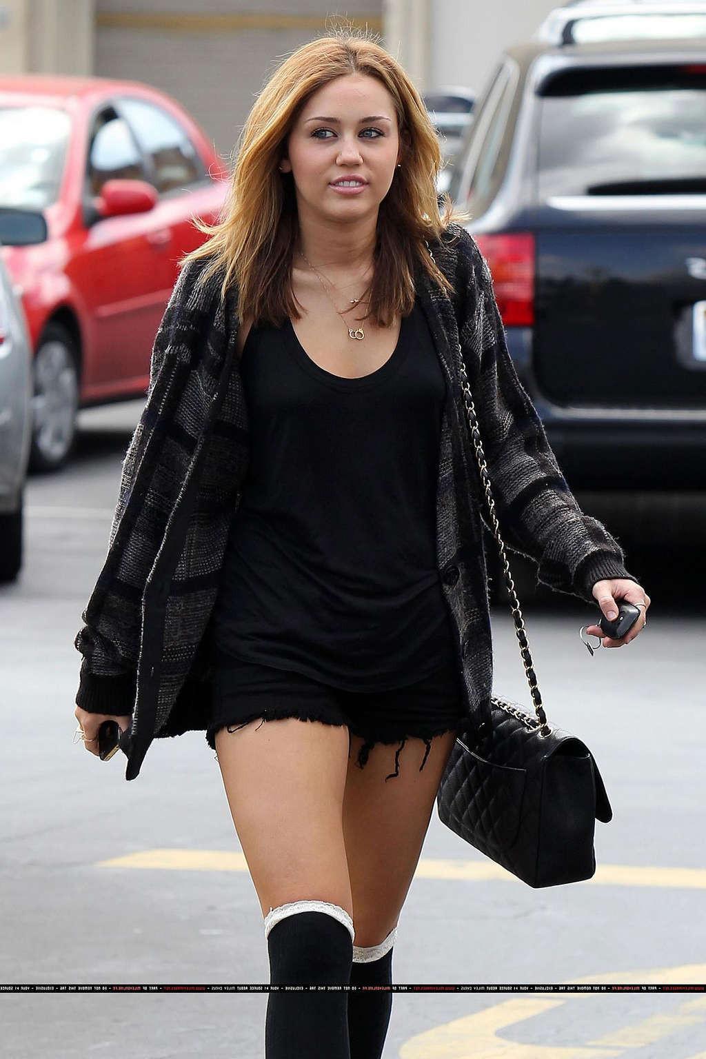 16P Miley Cyrus exposing fucking sexy body and nice tits in see thru shirt
