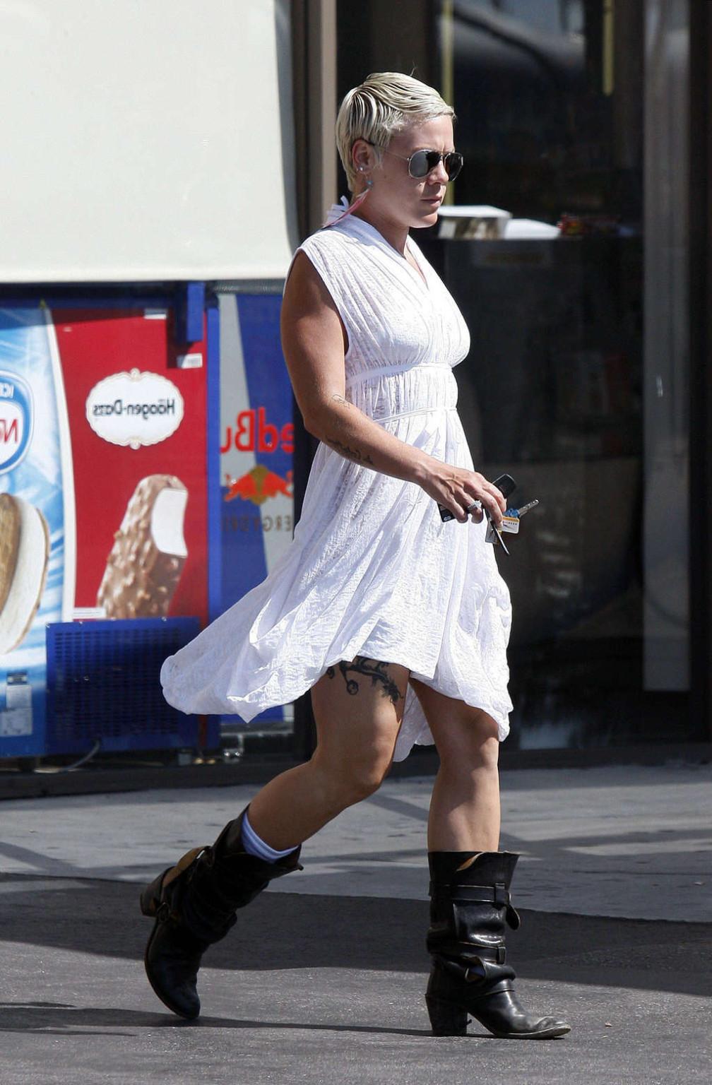 16P Pink exposing her sexy body and hot ass in see thru dress at gas station