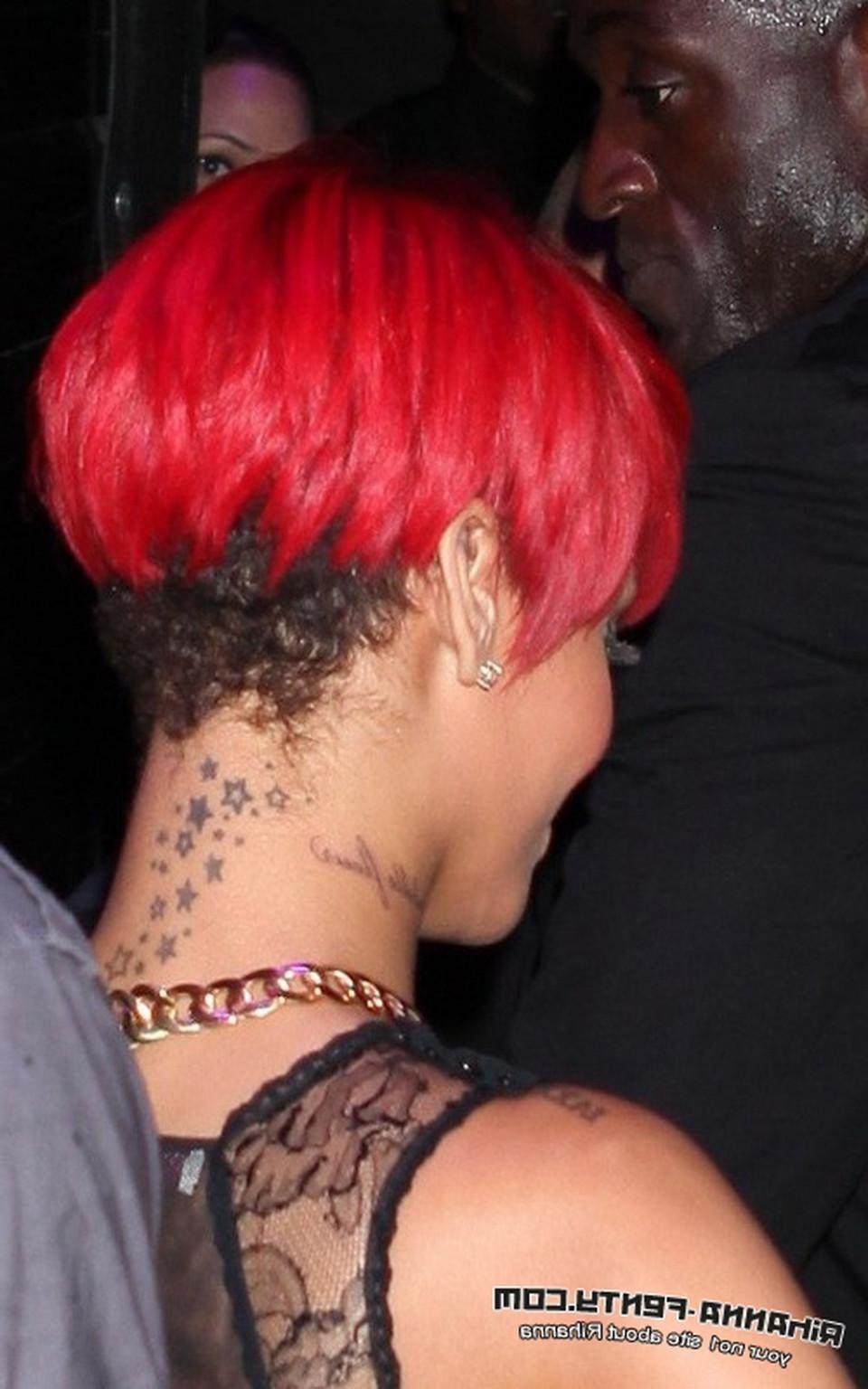 15P Rihanna showing off her boobs in black see-through dress