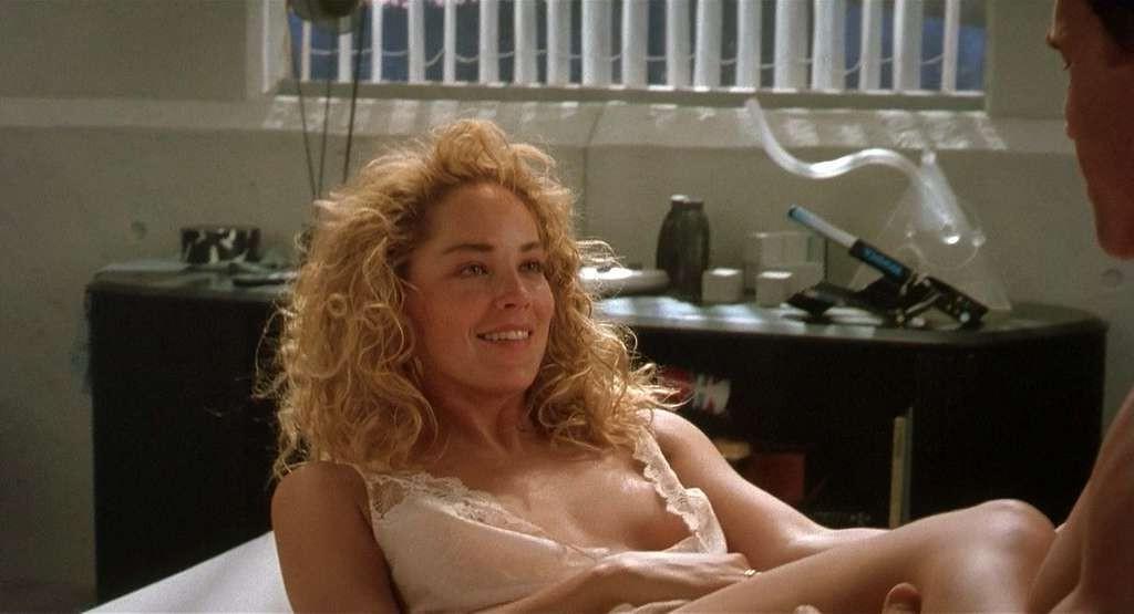 10P Sharon Stone get her tits slip out from nightgown and downblouse in movie