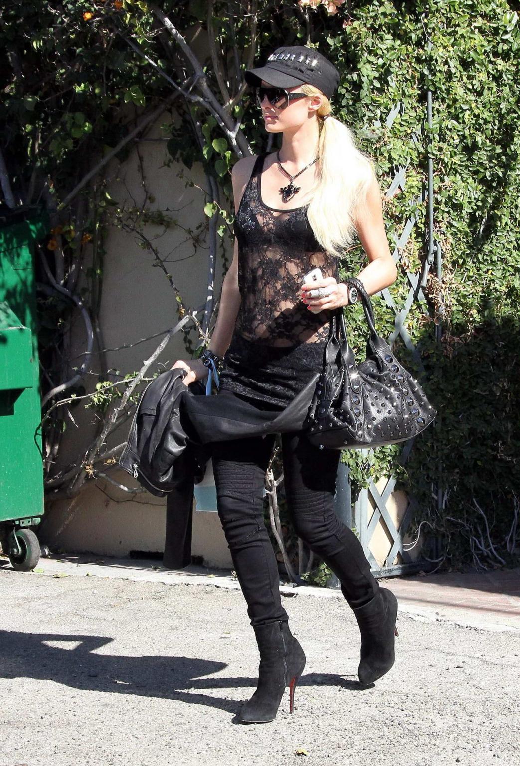 15P Paris Hilton in black bra  see-through top going shopping in LA