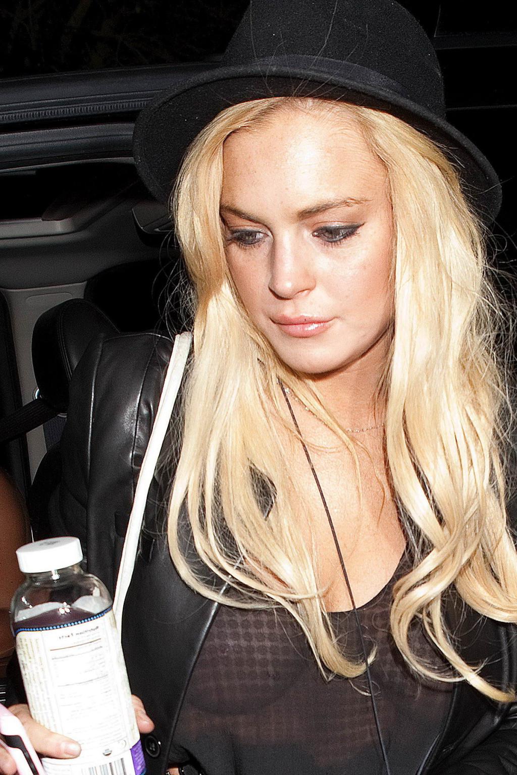 15P Lindsay Lohan braless in see-through top showing off her big boobs in LA