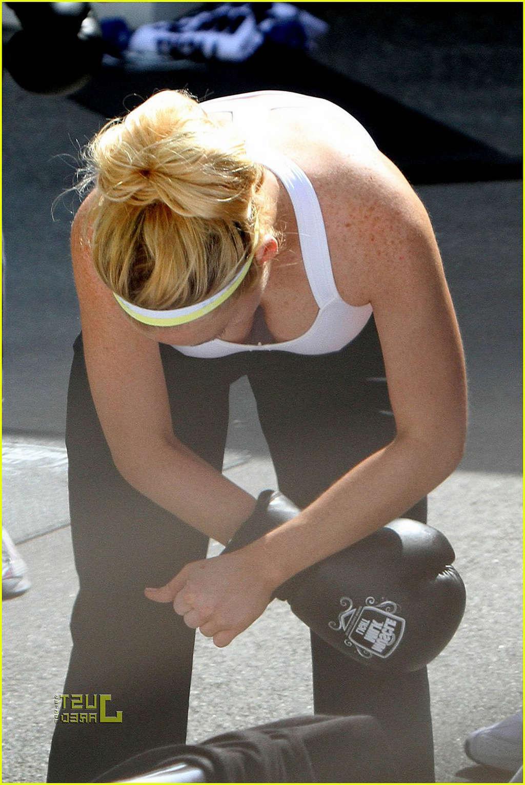 16P Lindsay Lohan in white sport bra learning boxing and downblouse