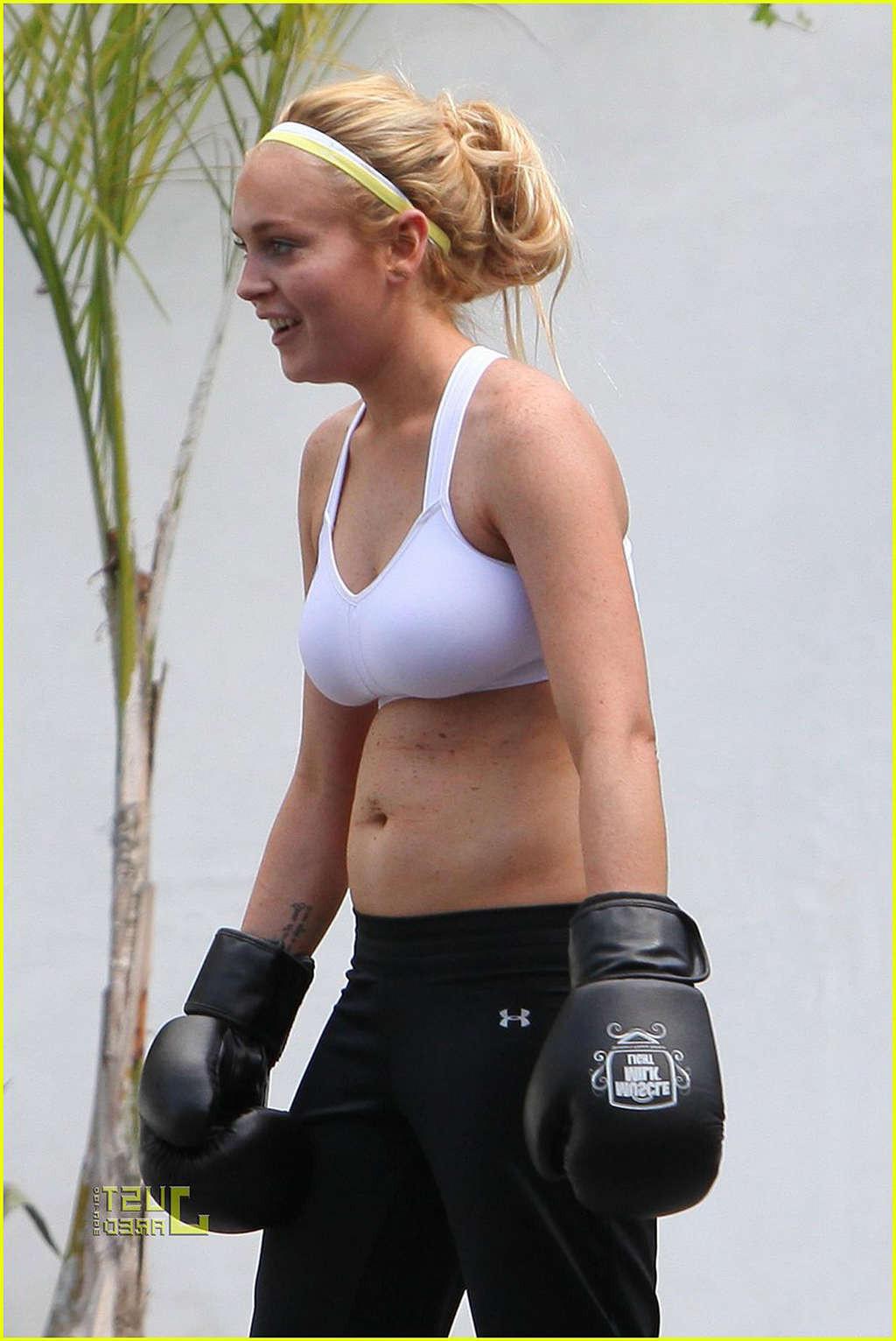 16P Lindsay Lohan in white sport bra learning boxing and downblouse