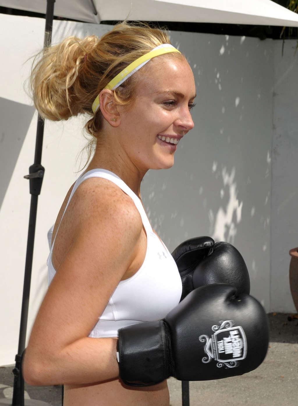 16P Lindsay Lohan in white sport bra learning boxing and downblouse