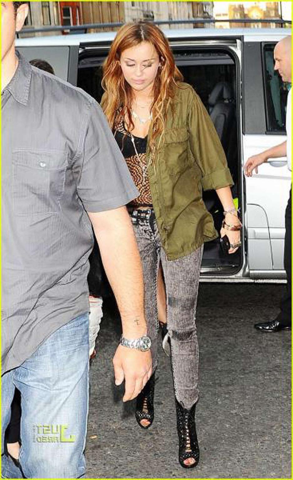 16P Miley Cyrus exposing her fucking sexy body and nice tits in see thru blouse