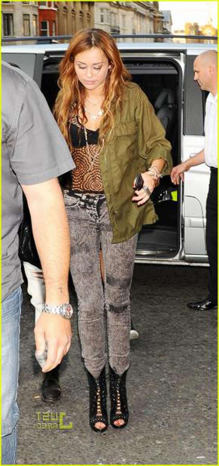 16P Miley Cyrus exposing her fucking sexy body and nice tits in see thru blouse
