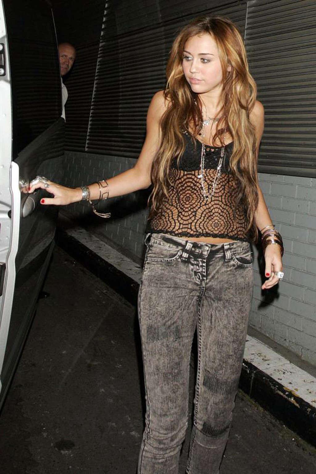 16P Miley Cyrus exposing her fucking sexy body and nice tits in see thru blouse