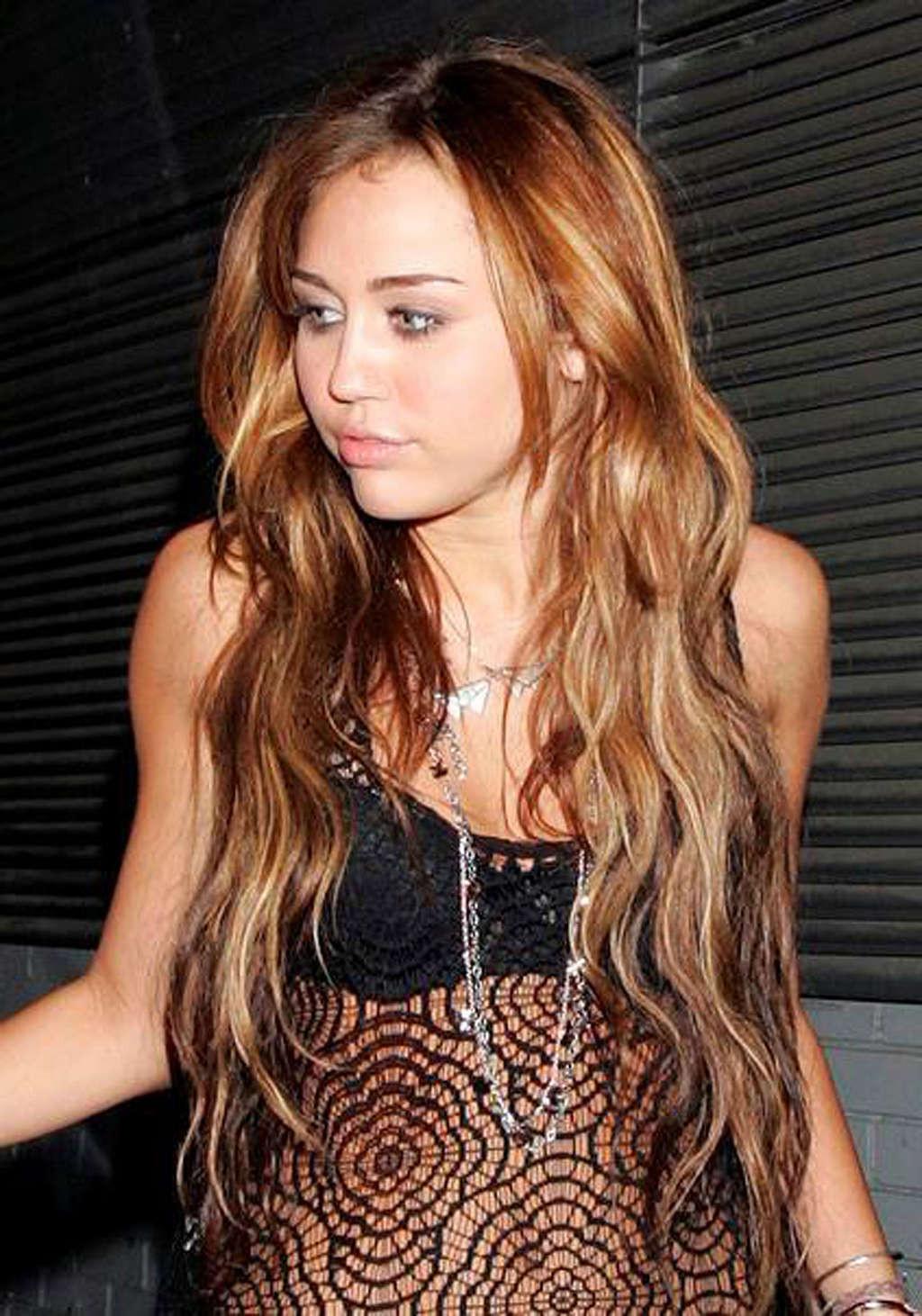 16P Miley Cyrus exposing her fucking sexy body and nice tits in see thru blouse