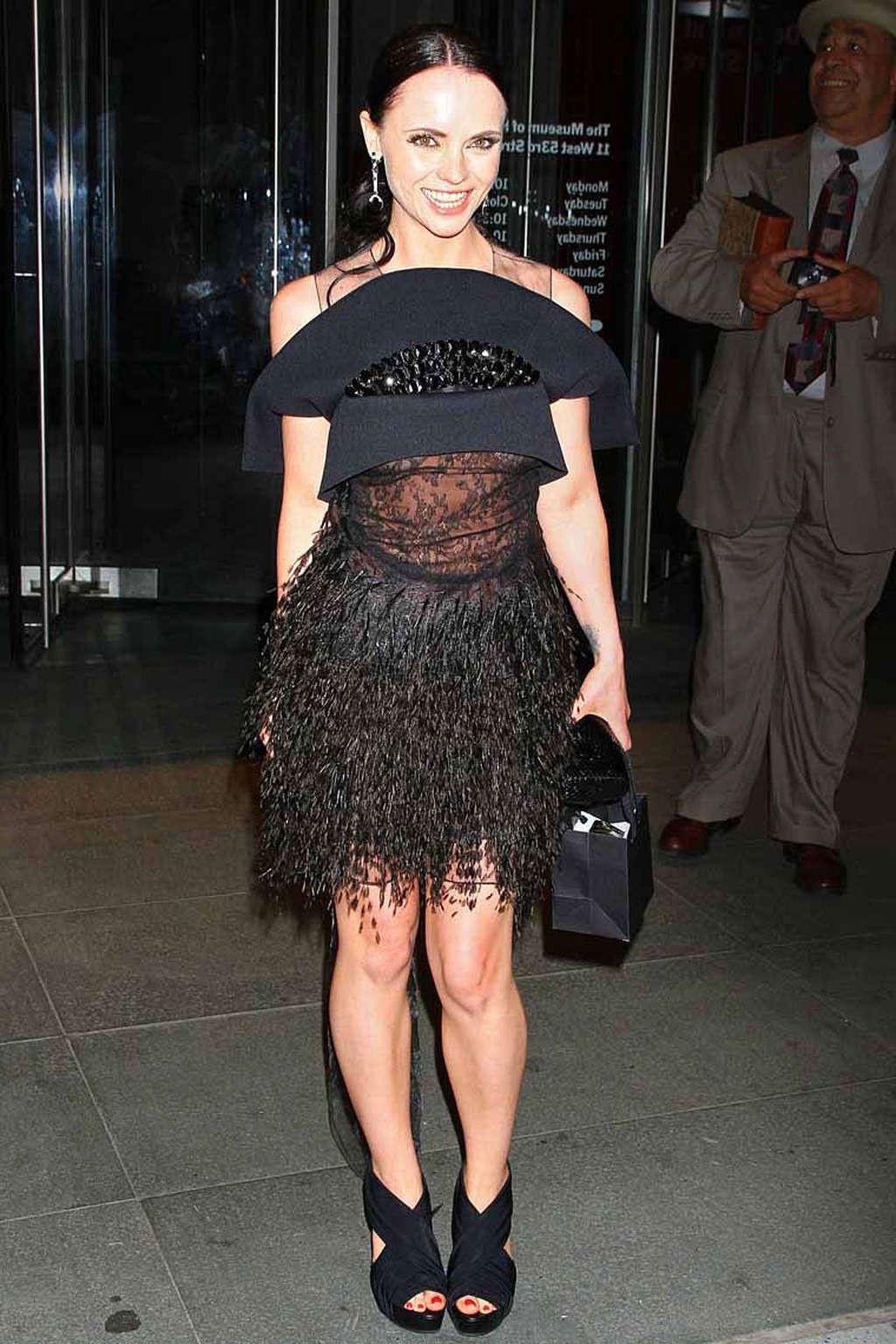 10P Christina Ricci in see thru dress and exposing her nice tits