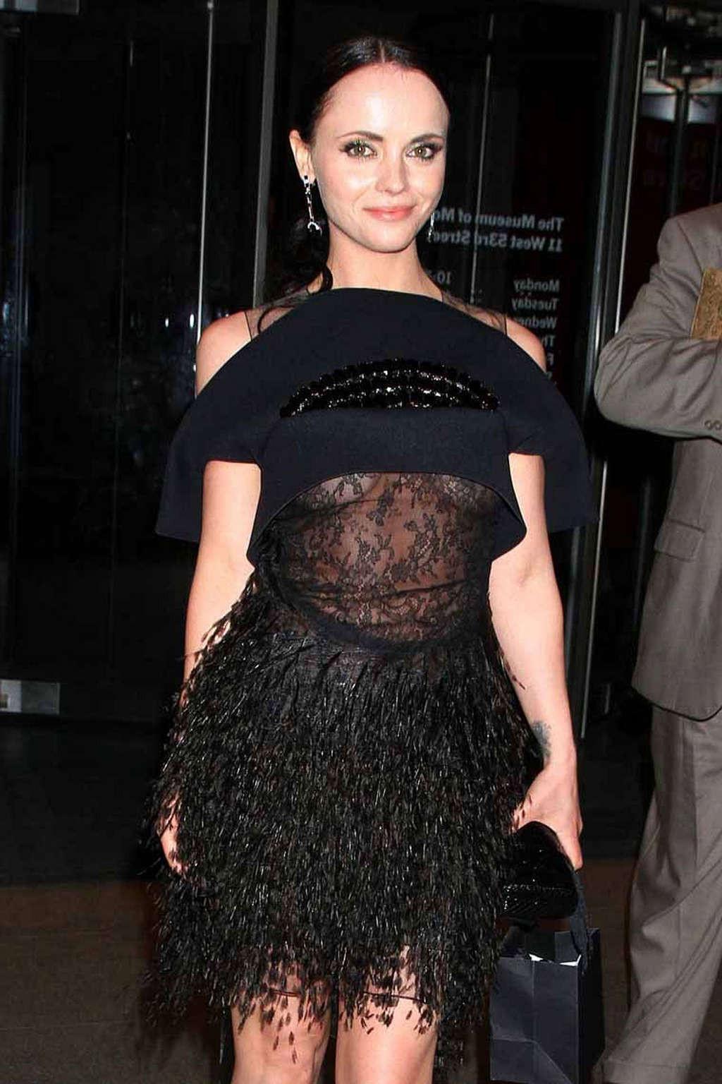 10P Christina Ricci in see thru dress and exposing her nice tits