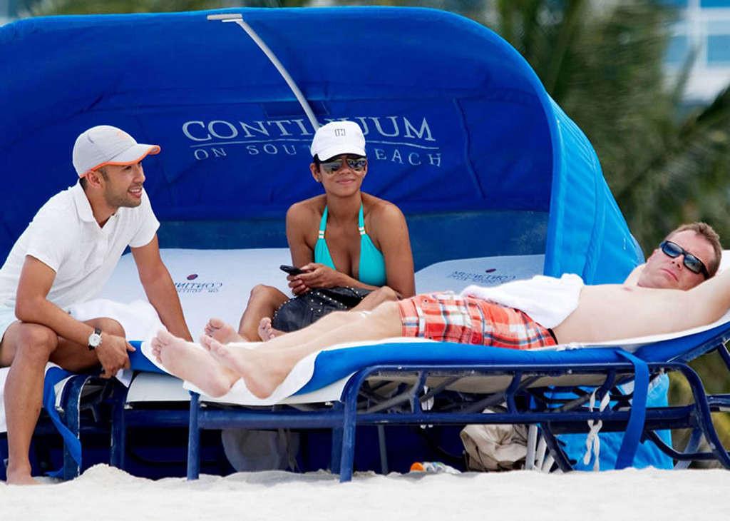 16P Halle Berry exposing her fucking sexy body in see thru dress on beach