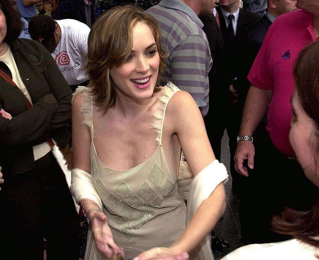 16P Winona Ryder almost downblouse and showing her tits