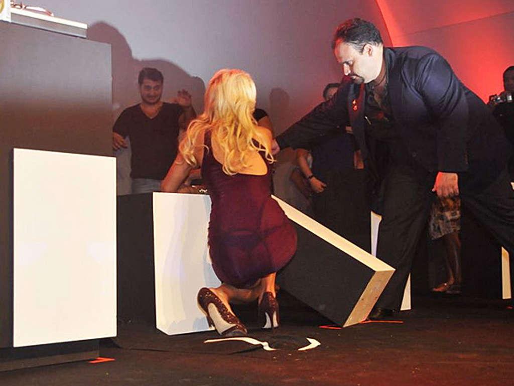 10P Paris Hilton showing thong in see thru dress and exposing her tits and pussy ups