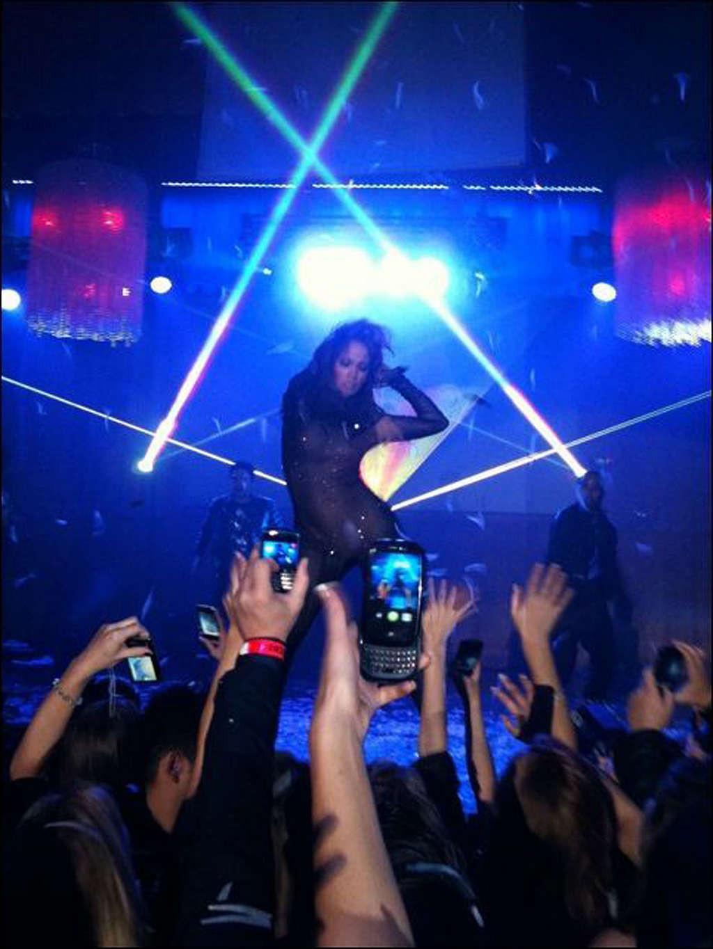 16P Jennifer Lopez leggy and in sexy outfit on stage and see thru
