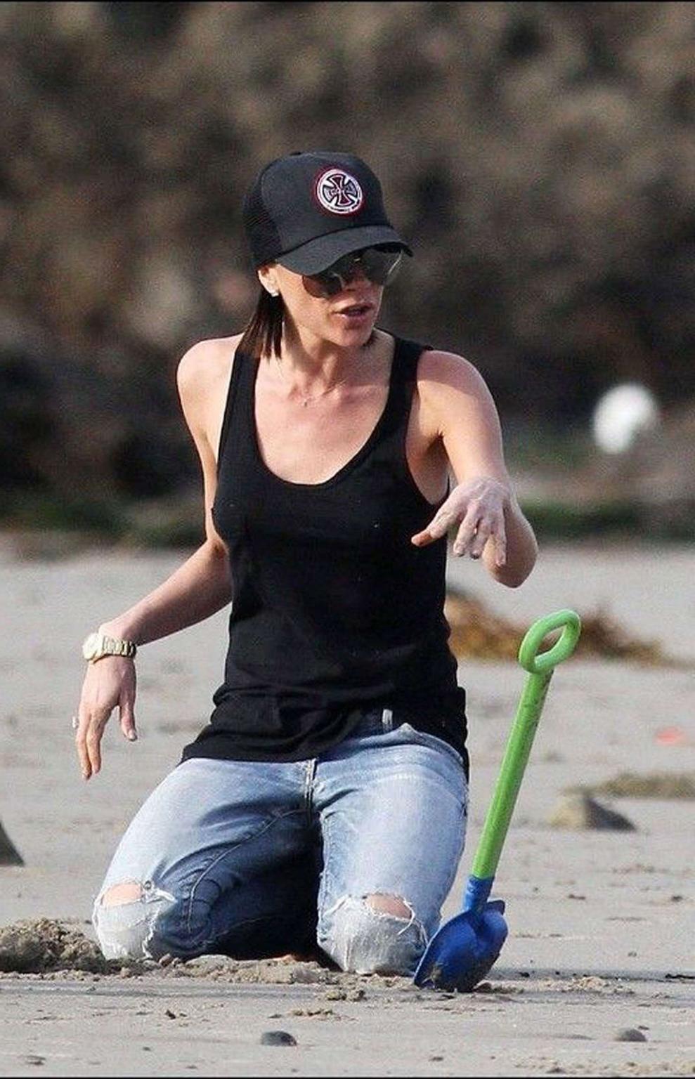 10P Victoria Beckham topless and tits exposed in see thru paparazzi pictures