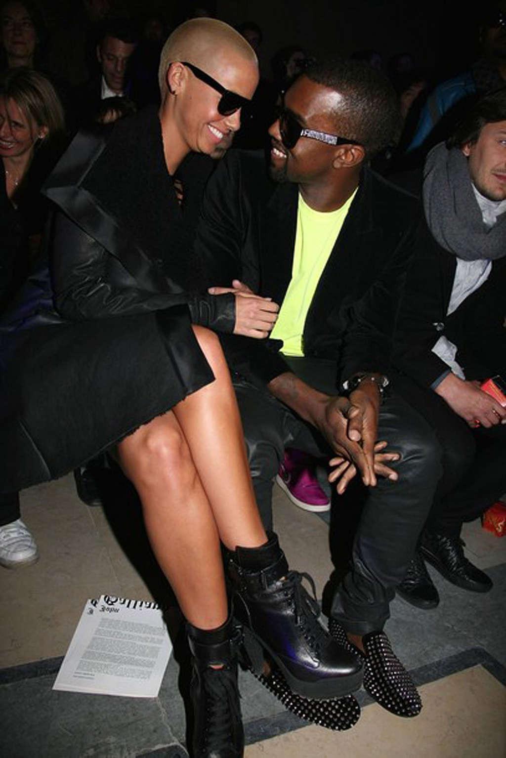 10P Amber Rose exposing her big tits and ass in thong and posing sexy in see thru dr